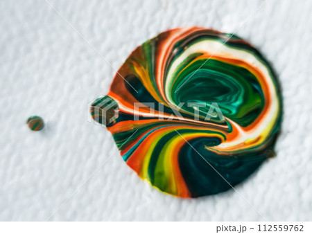 Abstract background of colored glass on a white background close-up 112559762