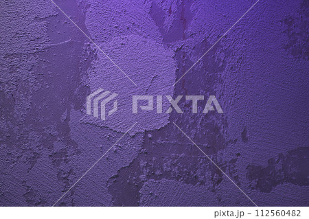 Close up of beautiful abstract texture decorative wall colored in very peri, violet, grungy stucco. Background with copy space. Concept of decor, design, wallpaper. 112560482