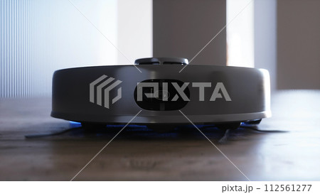 Vacuum Robot auto cleaning at home, floor. 3d rendering. Vacuum Robot auto cleaning at home, floor. 3d rendering. 112561277
