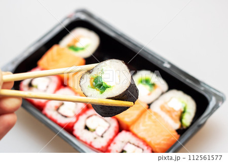 Bright beautiful rolls with fish close up 112561577