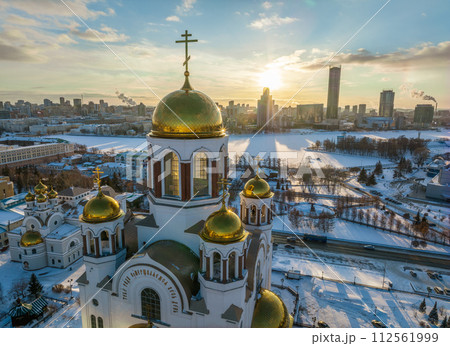 Winter Yekaterinburg and Temple on Blood in beautiful blue clear sunset. Aerial view of Yekaterinburg, Russia. Translation of the text on the temple Winter Yekaterinburg and Temple on Blood in beautiful blue clear sunset. Aerial view of Yekaterinburg, Russia. Translation of the text on the temple 112561999