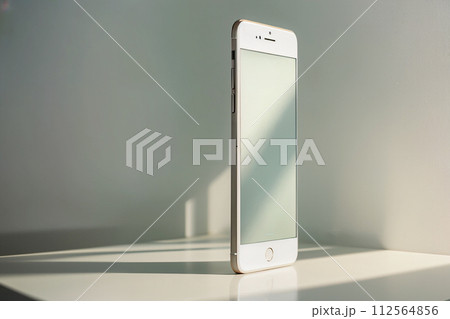 mobile phone on the window 112564856