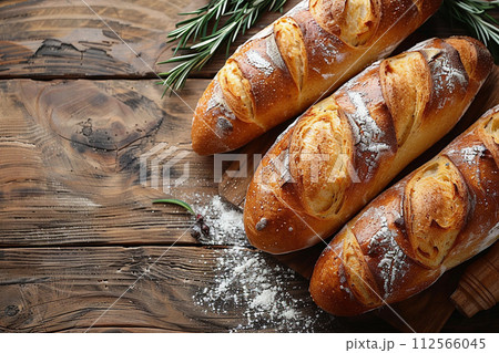 Bagutte on wooden table background ,top view, AI generated 112566045