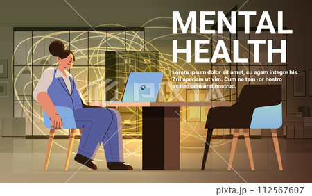 depressed student sitting at workplace sad girl suffering from psychological diseases anxiety mental health awareness month concept 112567607