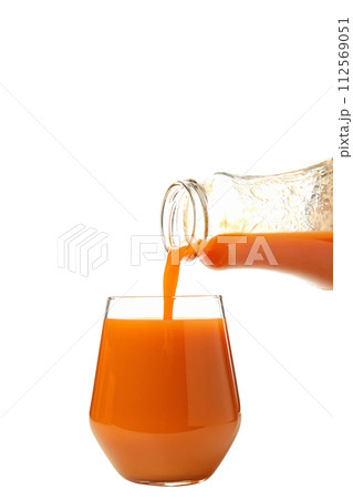 PNG, carrot juice is poured into a glass, isolated on a white background. PNG, carrot juice is poured into a glass, isolated on a white background. 112569051