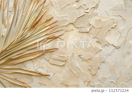 Dried palm leaf on sandy background. Generative AI 112571224