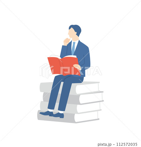 本に座って読書をするビジネスマン 本に座って読書をするビジネスマン 112572035