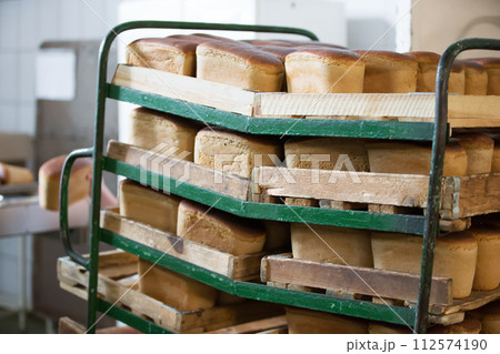 Bread on pallets for sale.Bread on pallets for sale. Bread in the warehouse Bread on pallets for sale.Bread on pallets for sale. Bread in the warehouse 112574190