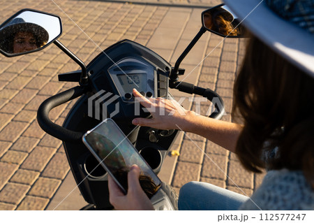 Dashboard of four wheel mobility electric scooter 112577247