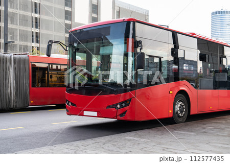 Modern bus on the city street. Modern bus on the city street. 112577435