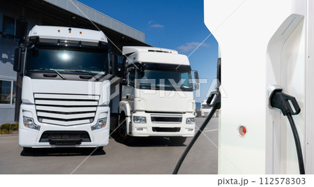 Semi truck fleet at the logistics center Semi truck fleet at the logistics center 112578303
