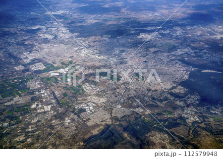 Aerial view of Santiago de Queretaro, a city in central Mexico. Panorama from airplane Aerial view of Santiago de Queretaro, a city in central Mexico. Panorama from airplane 112579948