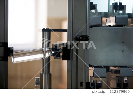 Beverage bottles. Technological work at the plant. Beverage bottles. Technological work at the plant. 112579960