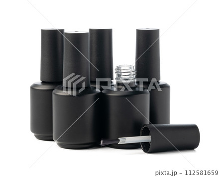 Black bottle of nail polish isolated on white background Black bottle of nail polish isolated on white background 112581659