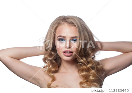 Cheerful blonde lady on white background. Beautiful blond woman studio portrait Cheerful blonde lady on white background. Beautiful blond woman studio portrait 112583440