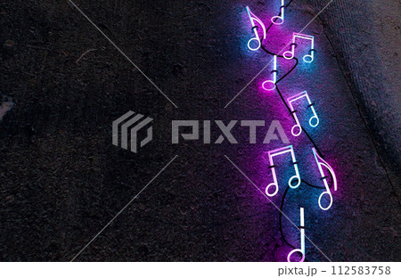 Neon musical note sign. Party and entertainment design. Neon musical note sign. Party and entertainment design. 112583758