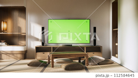 Smart Tv Mockup with blank green screen hanging in modern white empty room interior minimal designs. Smart Tv Mockup with blank green screen hanging in modern white empty room interior minimal designs. 112584645