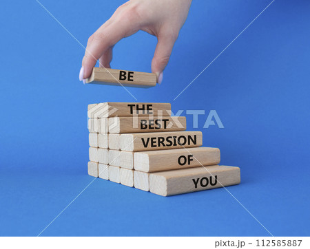 Be the best version of you symbol. Concept words Be the best version of you on wooden blocks. Businessman hand. Beautiful blue background. Business concept. Copy space. Be the best version of you symbol. Concept words Be the best version of you on wooden blocks. Businessman hand. Beautiful blue background. Business concept. Copy space. 112585887