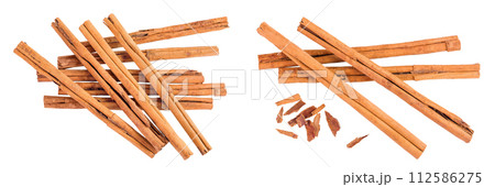 Cinnamon sticks isolated on white background with full depth of field. Top view. Flat lay. 112586275