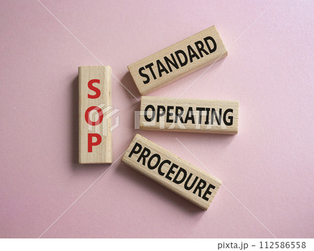 SOP - Standard Operating Procedure symbol. Wooden blocks with word SOP. Beautiful pink background. Business and SOP concept. Copy space. SOP - Standard Operating Procedure symbol. Wooden blocks with word SOP. Beautiful pink background. Business and SOP concept. Copy space. 112586558