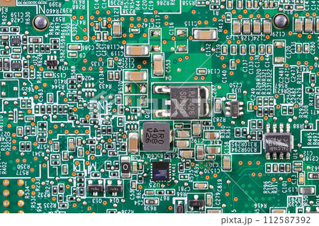 Computer printed circuit board with electronic components. Circuit board. Electronic computer hardware technology. Tech science background. Integrated communication processor. Information engineering. Computer printed circuit board with electronic components. Circuit board. Electronic computer hardware technology. Tech science background. Integrated communication processor. Information engineering. 112587392