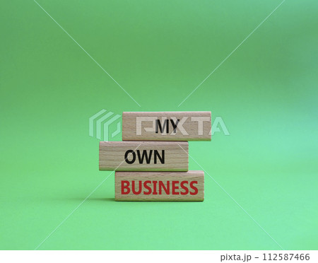 My own Business symbol. Concept words My own Business on wooden blocks. Beautiful green background Business and My own Business concept. Copy space. My own Business symbol. Concept words My own Business on wooden blocks. Beautiful green background Business and My own Business concept. Copy space. 112587466