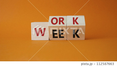 Work Week symbol. Turned wooden cubes with words Work Week. Beautiful orange background. Business and Work Week concept. Copy space 112587663