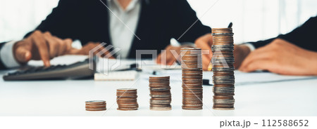 Growth coin stack symbolizing business investment. Shrewd Growth coin stack symbolizing business investment. Shrewd 112588652