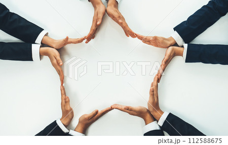 Business people join hand as frame for copyspace. Shrewd Business people join hand as frame for copyspace. Shrewd 112588675