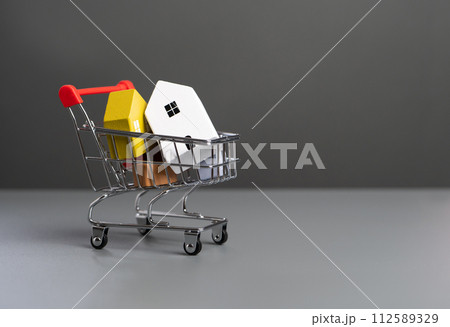 At home in a shopping cart. Affordable housing. Mortgage and loan. Investing in real estate abroad. Foreign housing. At home in a shopping cart. Affordable housing. Mortgage and loan. Investing in real estate abroad. Foreign housing. 112589329