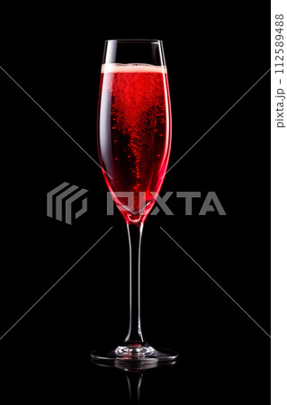 Set of crystal-clear flute glass of champagne isolated on black background Set of crystal-clear flute glass of champagne isolated on black background 112589488