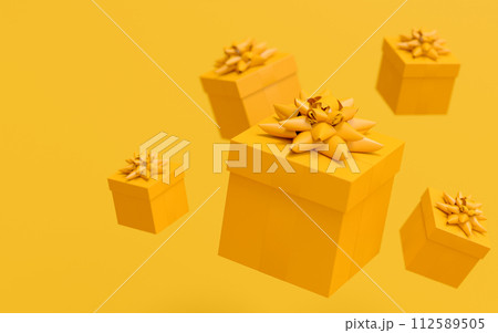 Gift boxes with ribbon and bow for Christmas flying and falling on monochrome Gift boxes with ribbon and bow for Christmas flying and falling on monochrome 112589505