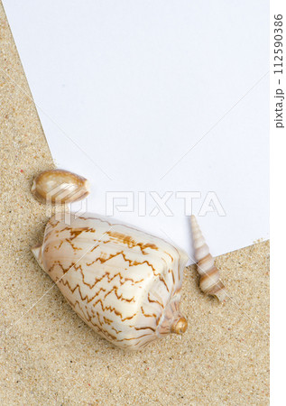 Blank paper on sand Blank paper on sand 112590386
