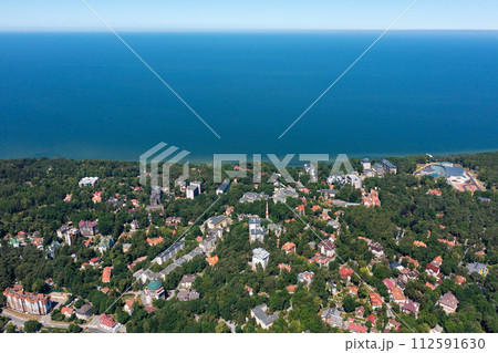 Baltic sea beach with Svetlogorsk town. Aerial view Baltic sea beach with Svetlogorsk town. Aerial view 112591630