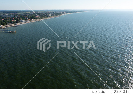 Baltic sea coastline with Zelenogradsk embankment for promenade. Kaliningrad region. Aerial 112591833