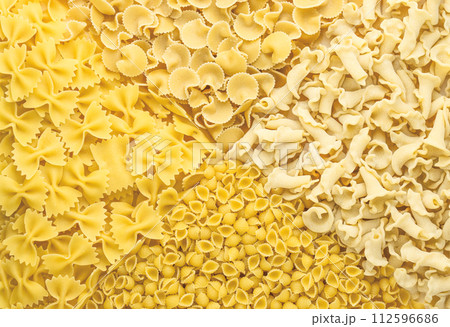 Background of different pasta types. Concept of culinary, food backgrounds. The view from the top. 112596686