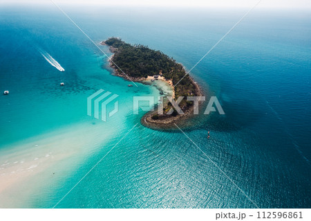 Tropical island from above and clear blue sea Tropical island from above and clear blue sea 112596861