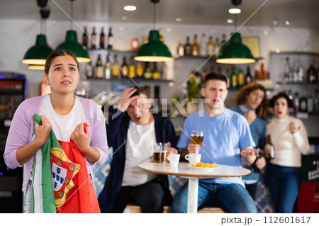 Portuguese fans are upset by loss of their favorite team Portuguese fans are upset by loss of their favorite team 112601617