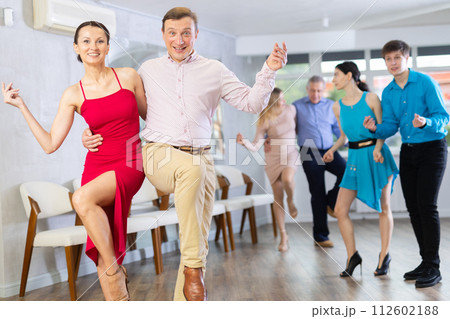 Adult couple dancing Adult couple dancing 112602188