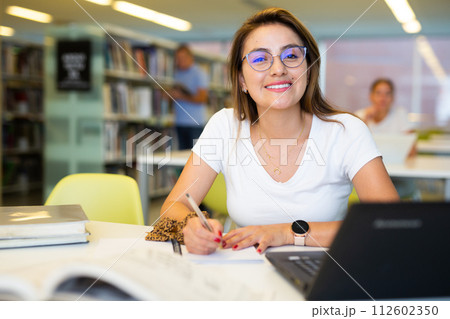 Smart female Latina student preparing for the exam Smart female Latina student preparing for the exam 112602350