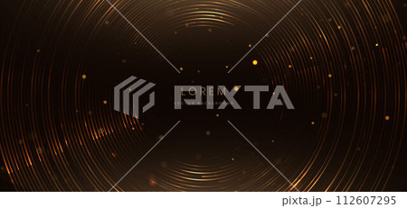 Luxury design glowing golden circles lines on dark brown background with lighting effect. 112607295
