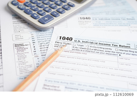 Tax form 1040 U.S. Individual Income Tax Return, business finance concept. 112610069