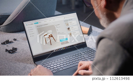 Craftsman uploads pictures of stylish chair to online store Craftsman uploads pictures of stylish chair to online store 112613498