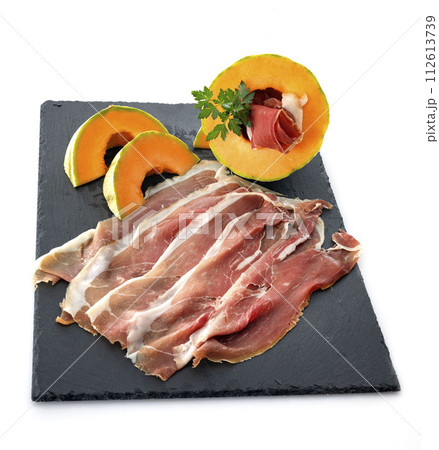 slice of cured ham and melon slice of cured ham and melon 112613739