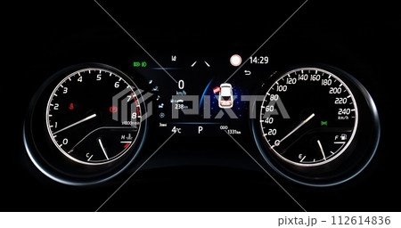 Car speedometer and sensors on a control panel background, car elements close view Car speedometer and sensors on a control panel background, car elements close view 112614836