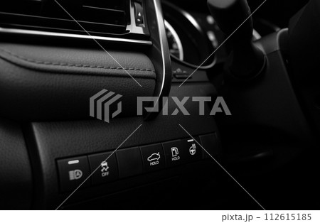 Car buttons on a control panel background, car elements close view 112615185