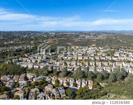 Aerial view of middle class subdivision neighborhood with residential houses in San Diego, California, USA. 112616380