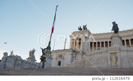 Italian Flag and the glory of Rome monuments Italian Flag and the glory of Rome monuments 112616479