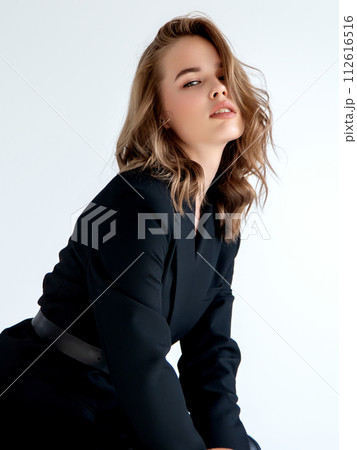 Beautiful fashionable girl haired with long curly 112616516