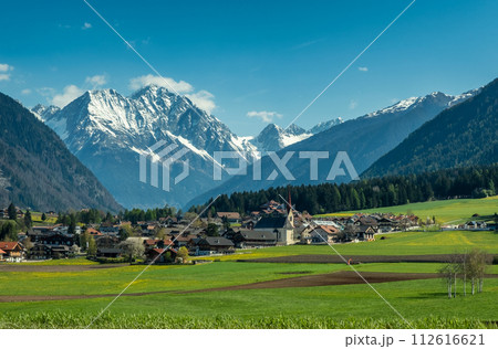 Town and valley in Austria and Alps mountains 112616621